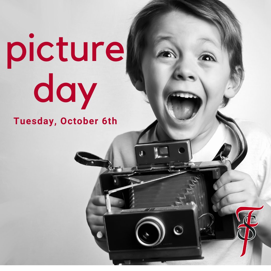 Young boy holding vintage camera with words Picture Day next to him